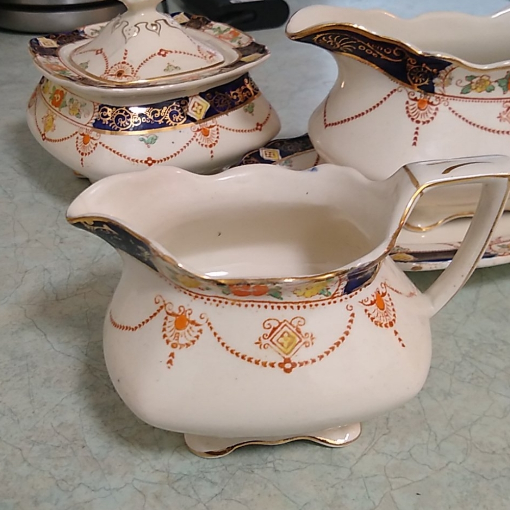 Creamer,Sugar Bowl & cover , gravy boat & platter